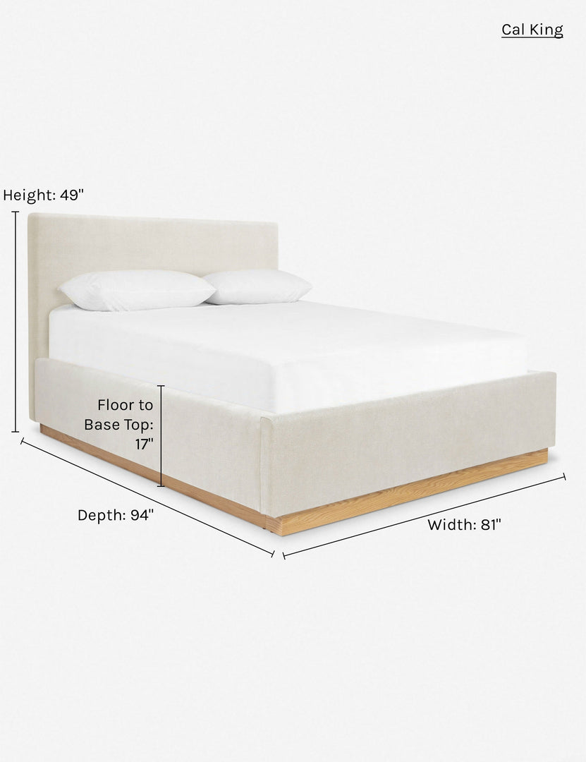 Dimensions on the california king-sized Lockwood natural velvet-upholstered bed with a white oak base.