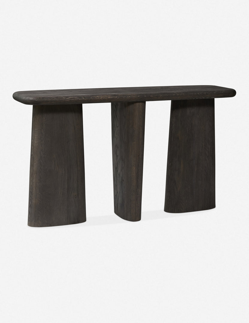 Angled view of the Nera black wood sculptural console table