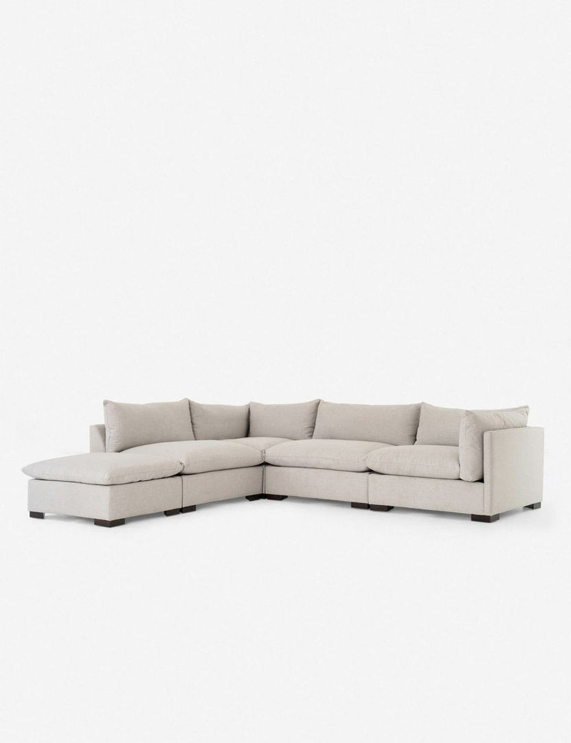 Angled view of the Mitzi gray linen modular sectional sofa