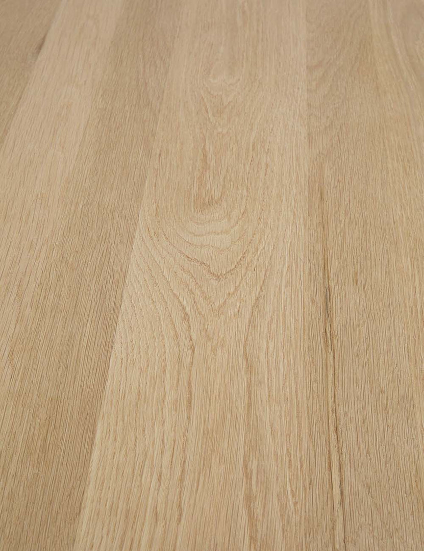 Detailed view of the oak wood on the Reese oak wood rectangular dining table.