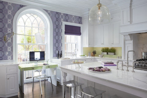 Violet and blue wallpaper in white kitchen with lime green desk