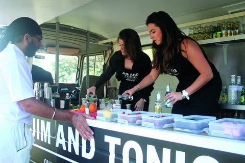 Jim and Tonic staff serving gin and tonics at corporate golf event
