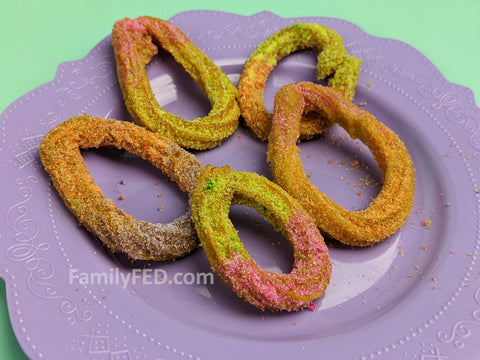 Decorate Disney churros as Easter eggs for a holiday Easter treat.