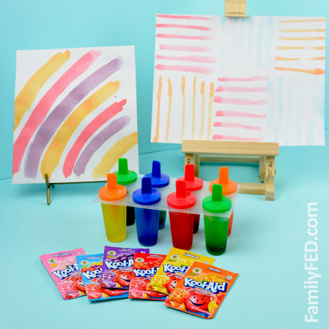 Paint with homemade Popsicles made from Kool-Aid for a perfect summertime arts and crafts activity!