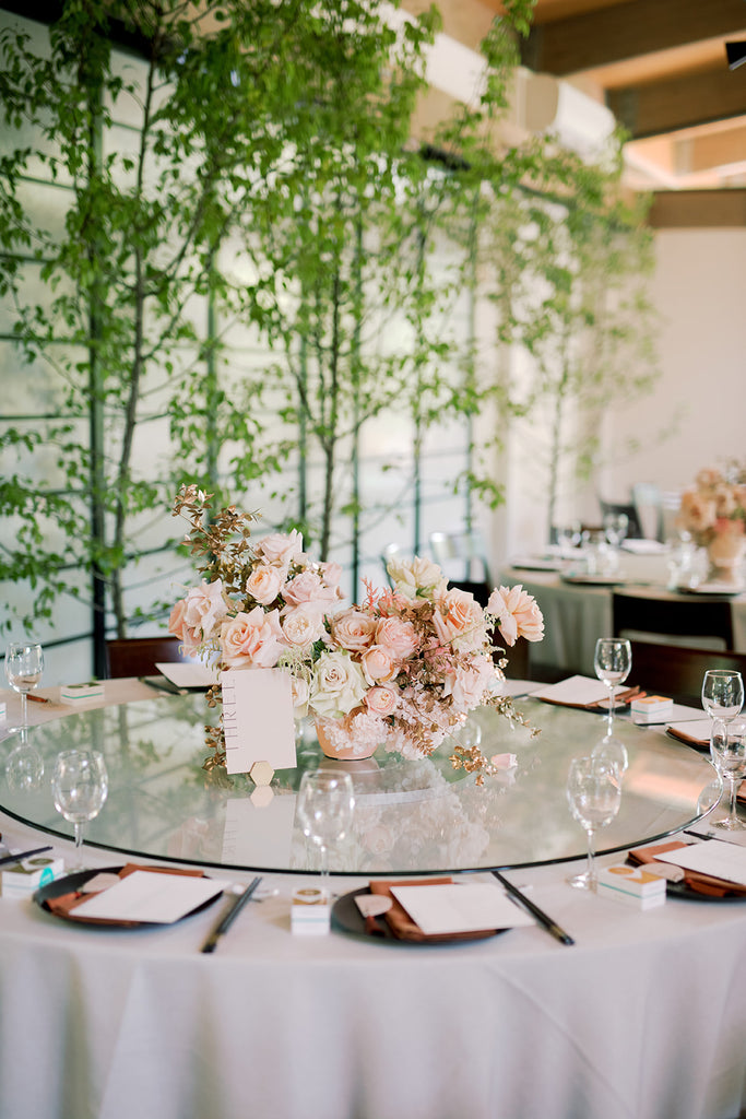 Rust, ivory and peach wedding table styling