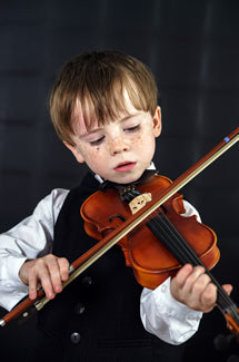 Young boy playing the Violin