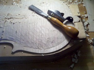 Cello form on a workbench