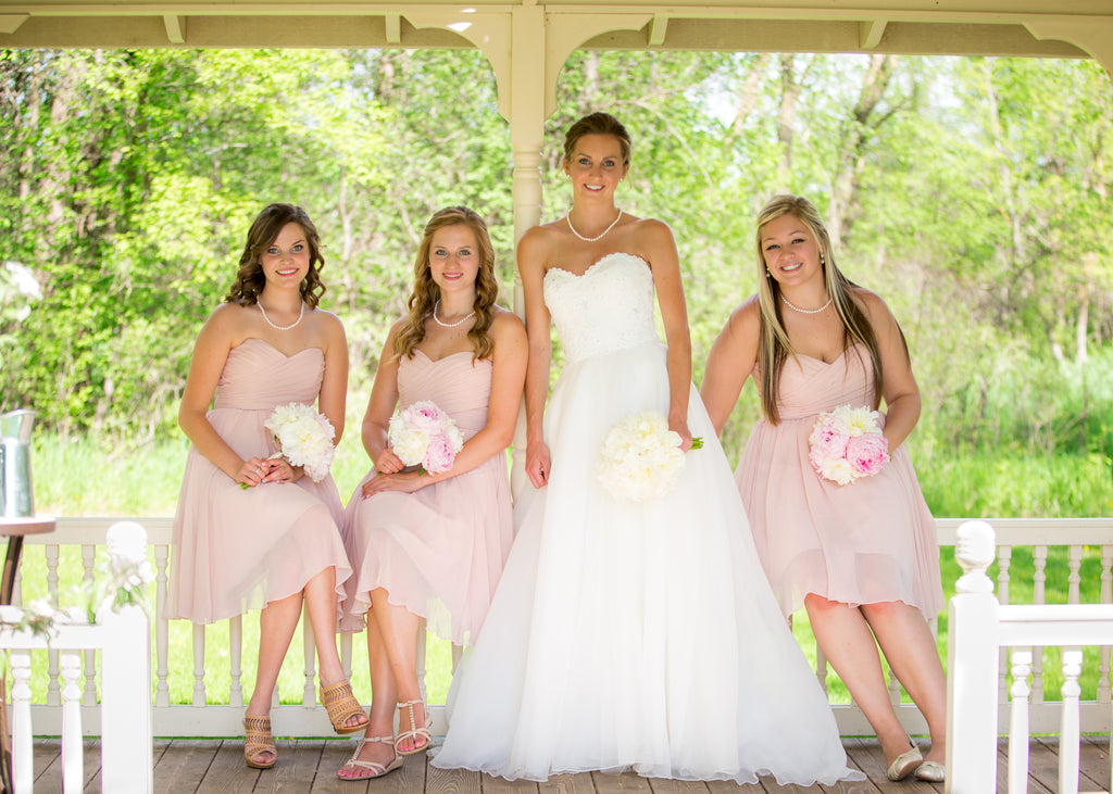 Short strapless blush pink bridesmaid dresses | 11 Pin-Worthy Bridal Parties | Melissa Jopp Photography | Kennedy Blue
