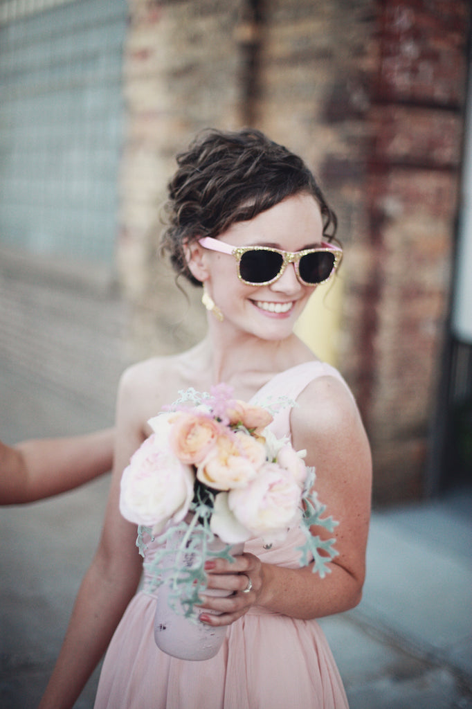 A lovely blush pink, chiffon bridesmaid dress. | A Whimsical Gold and Pink Wedding Day