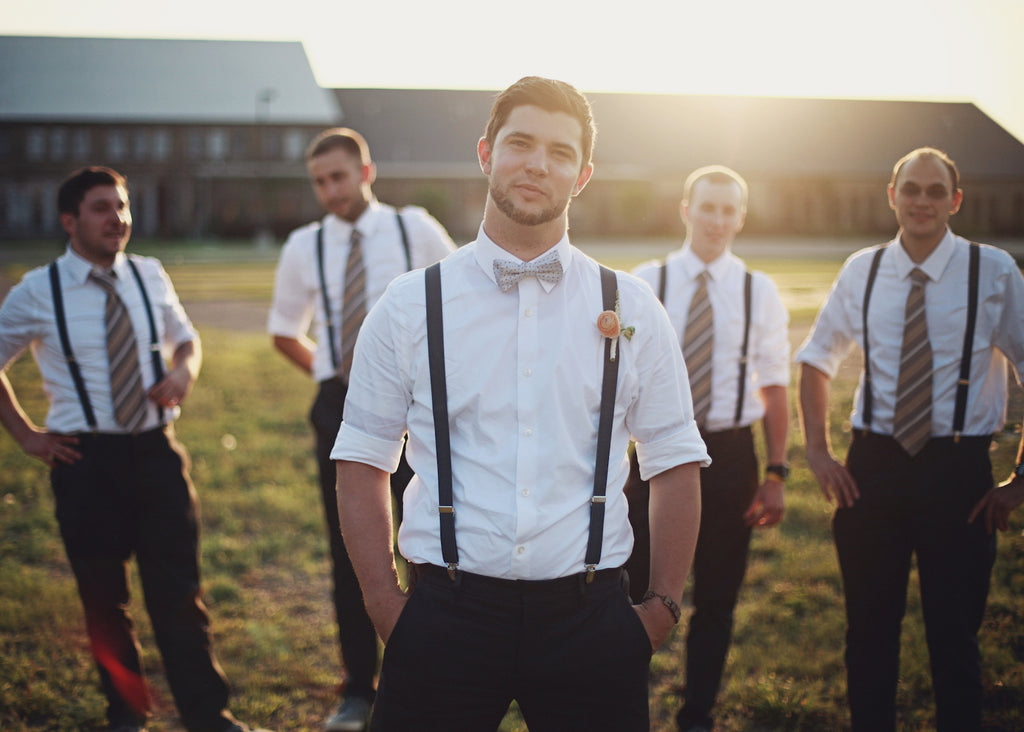 Style the guys in suspenders and a bowtie. | A Whimsical Gold and Pink Wedding Day