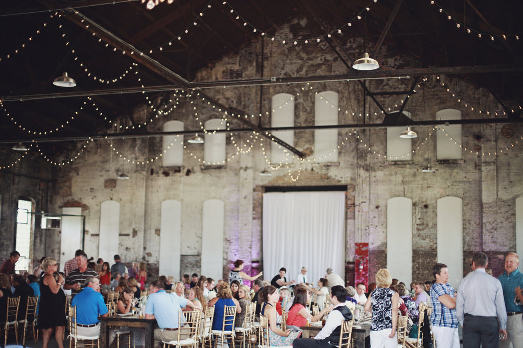 How cool is this rustic, industrial wedding venue? | A Whimsical Gold and Pink Wedding Day