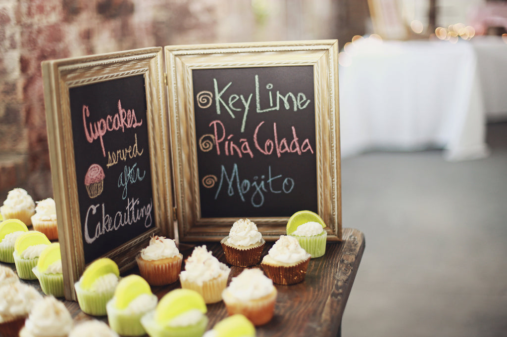 The desert table included an assortment of cupcakes. | A Whimsical Gold and Pink Wedding Day