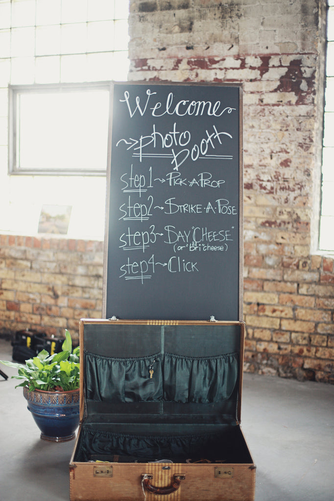 A wedding photobooth. | A Whimsical Gold and Pink Wedding Day