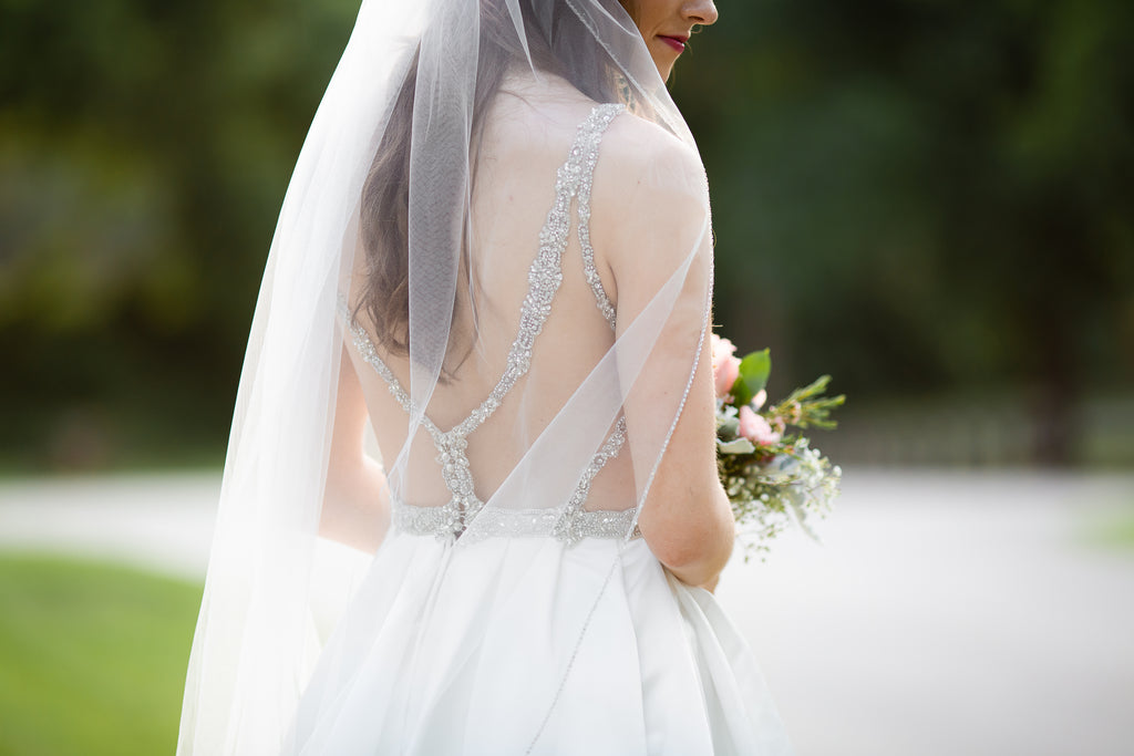 Beautiful beaded detailing on the back of Madison's Bridal Gown 