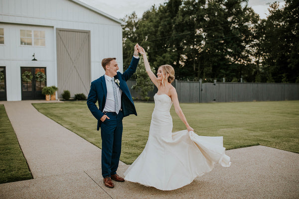 Groom Spinning Bride