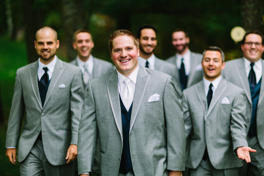 The groom and his men outfitted in gray and navy suits | A Nautical-Inspired Wedding Day