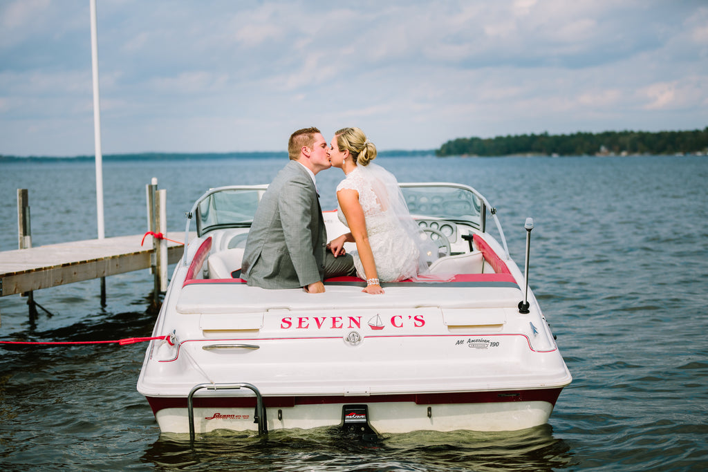 The couple's engagement took place on their boat. So romantic! | A Nautical-Inspired Wedding Day
