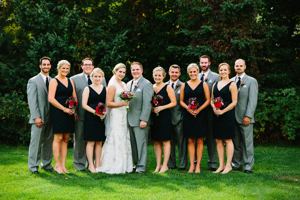 A stunning navy and gray bridal party | A Nautical-Inspired Wedding Day