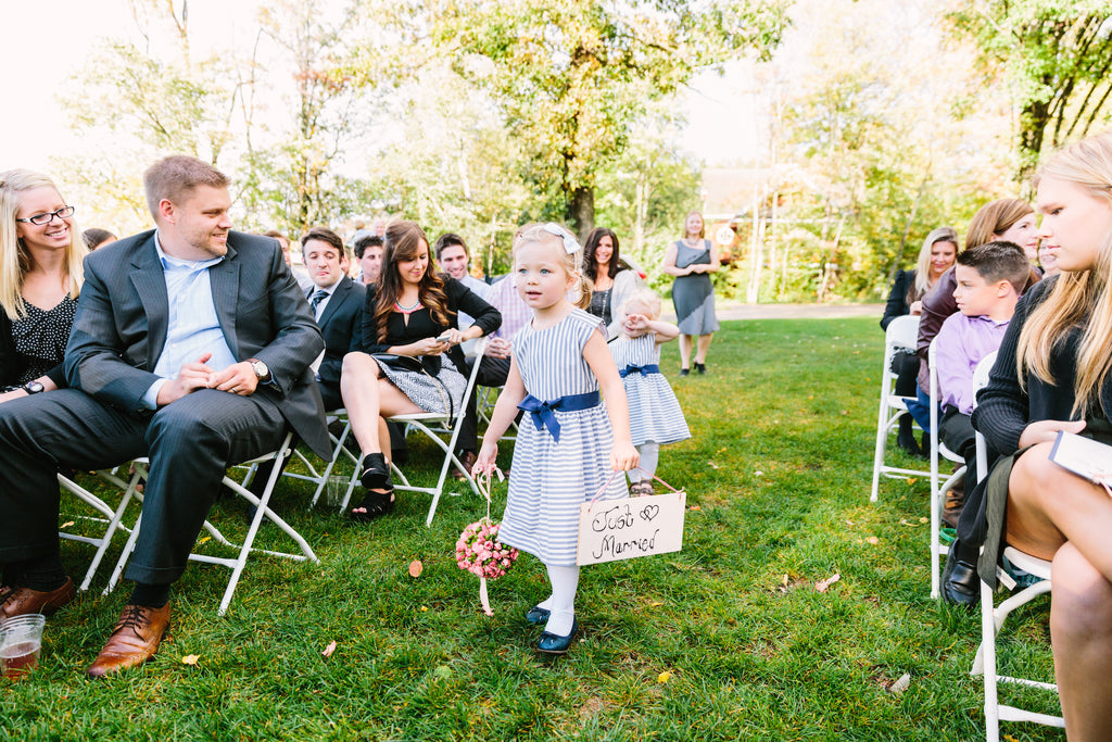 The adorably sweet flower girls | A Nautical-Inspired Wedding Day