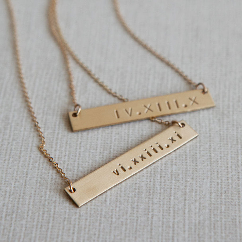 A hand-stamped bar necklace from LEILAjewelryshop