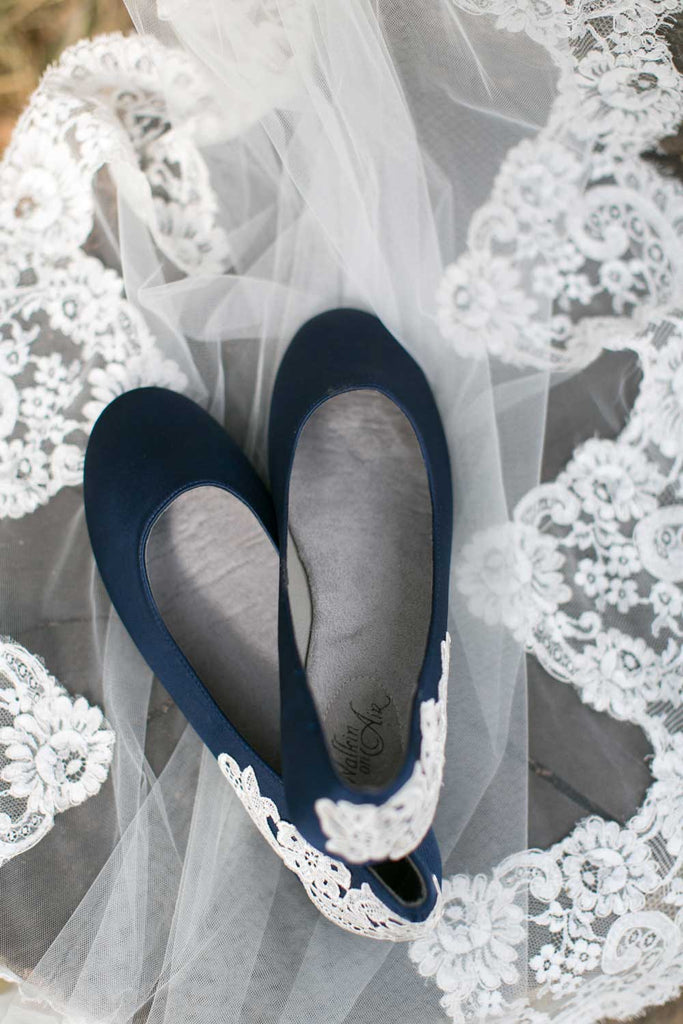 Navy blue wedding shoes with a gorgeous lace applique.