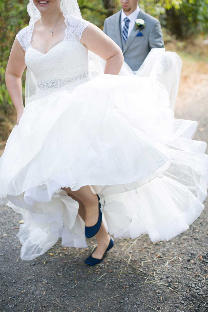 The bride wore navy shoes for her 'something blue'.