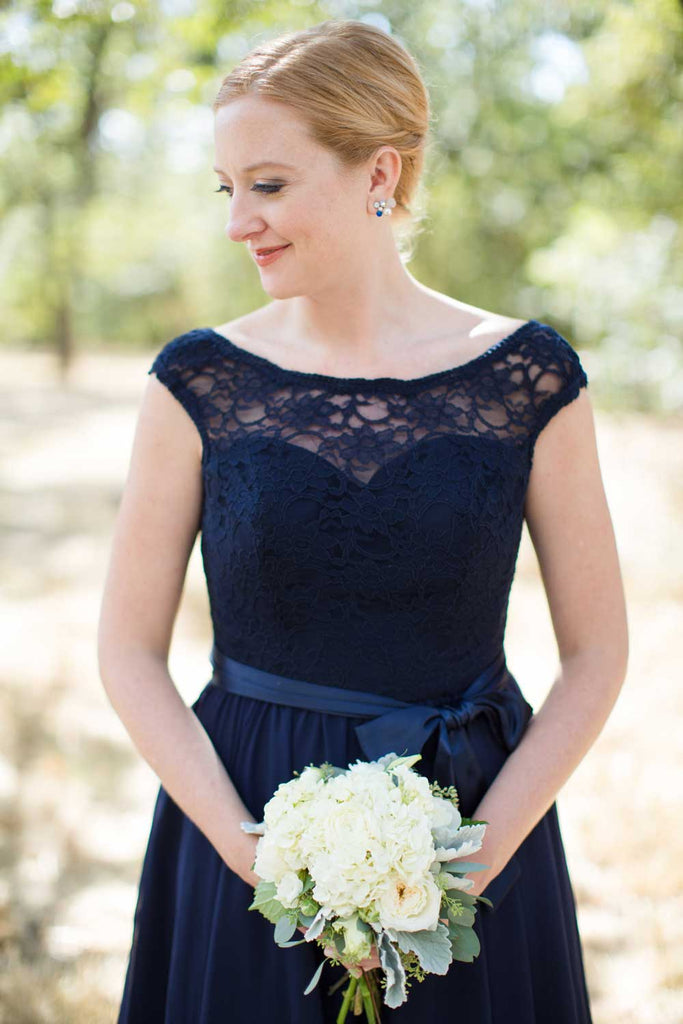 How gorgeous is this illusion lace neckline on this navy bridesmaid dress?