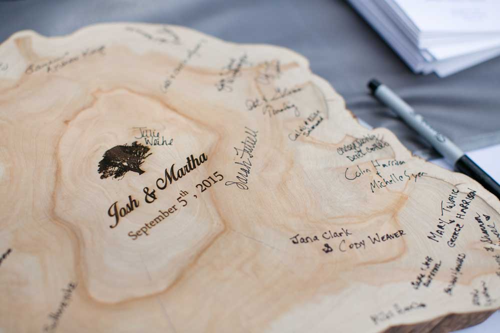 A gorgeous wood slice served as their wedding guest book.