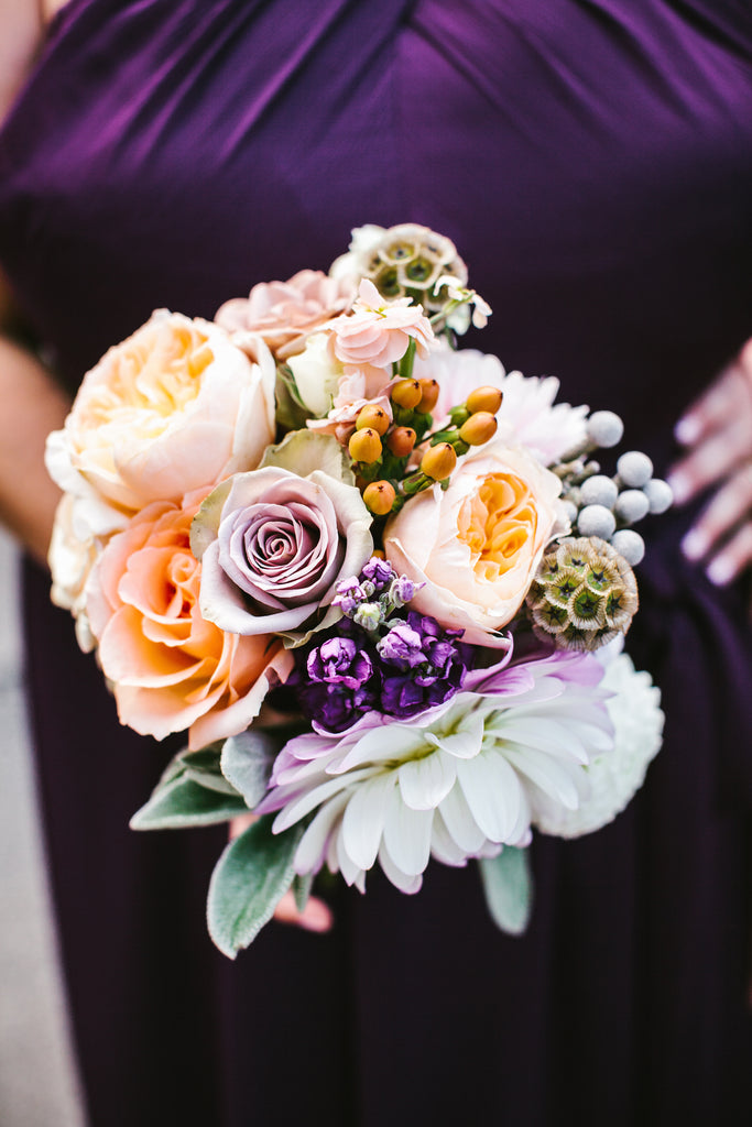 Pastel bridesmaid bouquet with a purple bridesmaid dress | A Chic Purple and Gold Pittsburgh Wedding