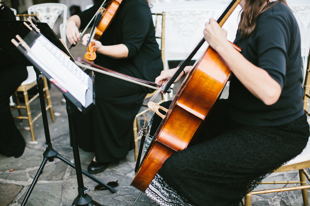 Live orchestra for the wedding ceremony music | A Chic Purple and Gold Pittsburgh Wedding
