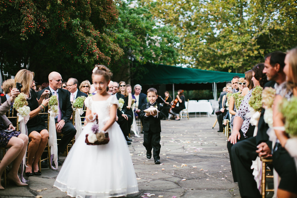 Flower girl and ring bearer at the wedding ceremony | A Chic Purple and Gold Pittsburgh Wedding