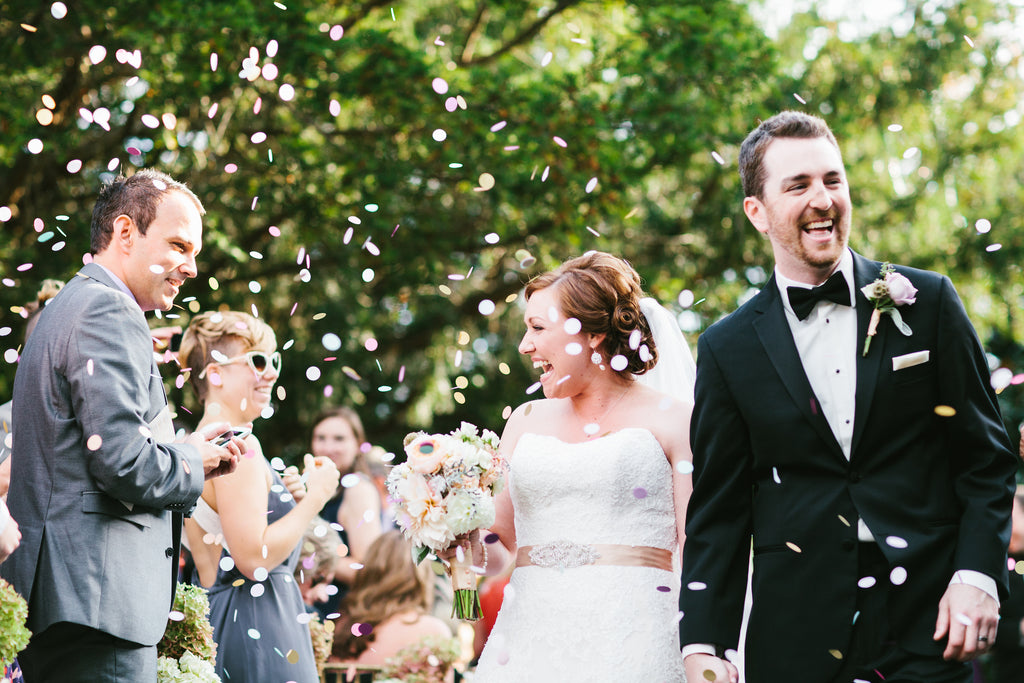 Confetti was thrown after the wedding ceremony | A Chic Purple and Gold Pittsburgh Wedding