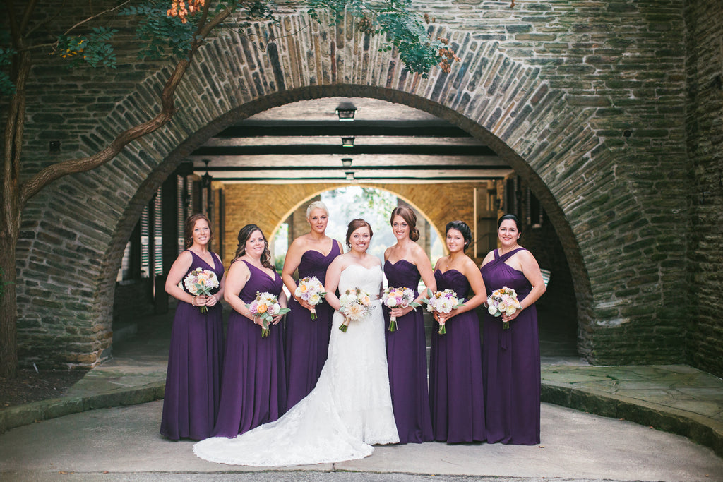 The bridal party wore eggplant purple bridesmaid dresses by Kennedy Blue | A Chic Purple and Gold Pittsburgh Wedding