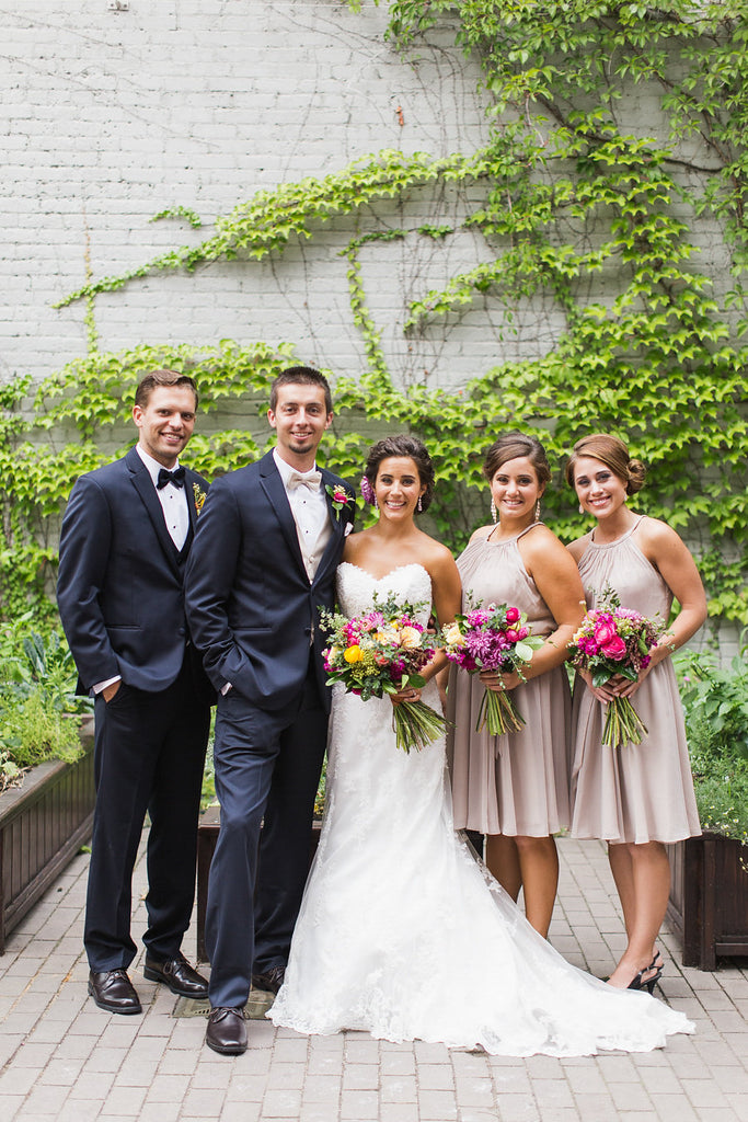 Dark charcoal suits with neutral, latte bridesmaid dresses | Floral Graffiti Inspiration at The Big Fake Wedding