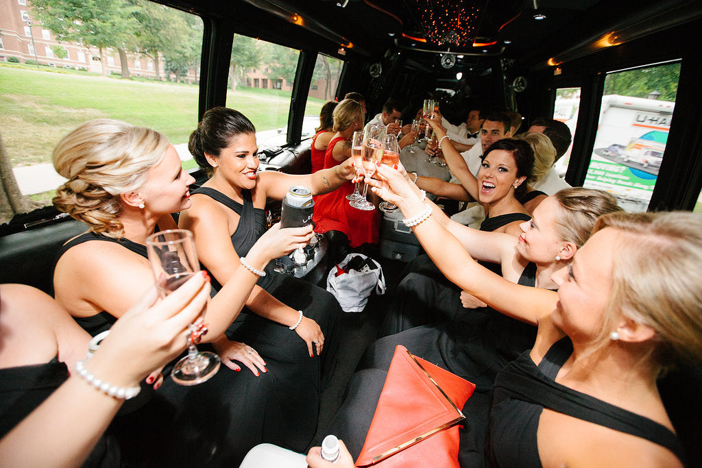 The bridal party had a party bus between the ceremony and reception. | A Timeless and Traditional Mansion Wedding