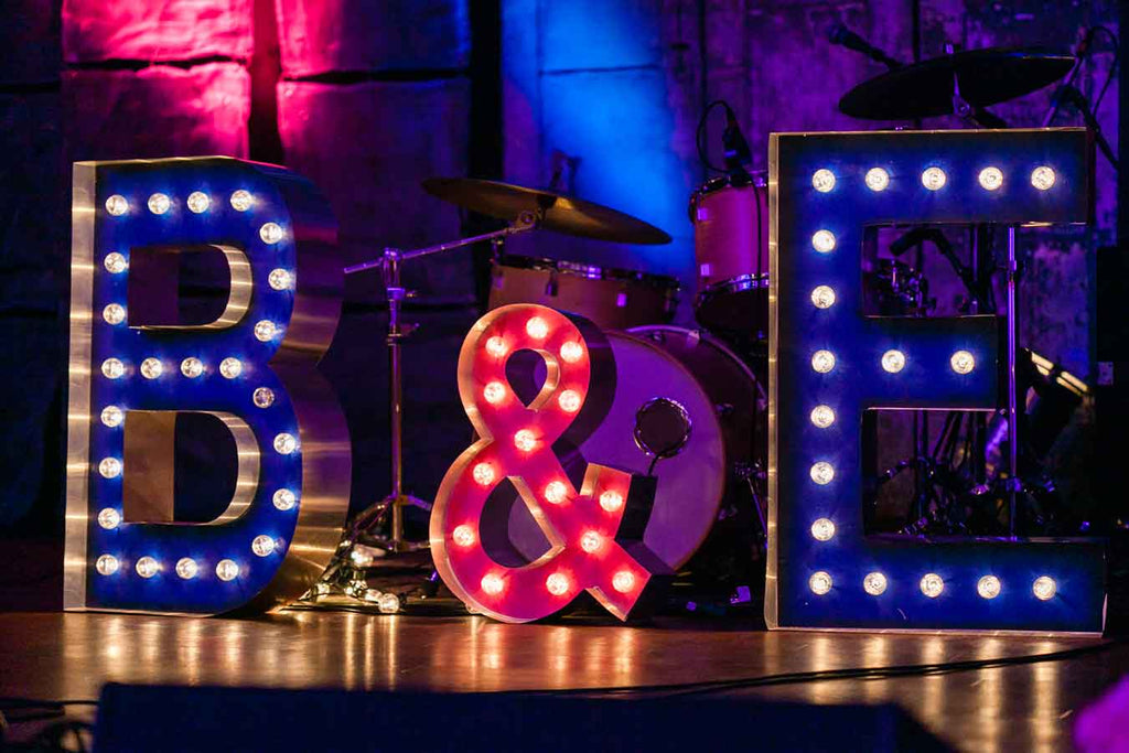 Marquee signs used as wedding decor | A Blue and Pink Rock 'n Roll Wedding