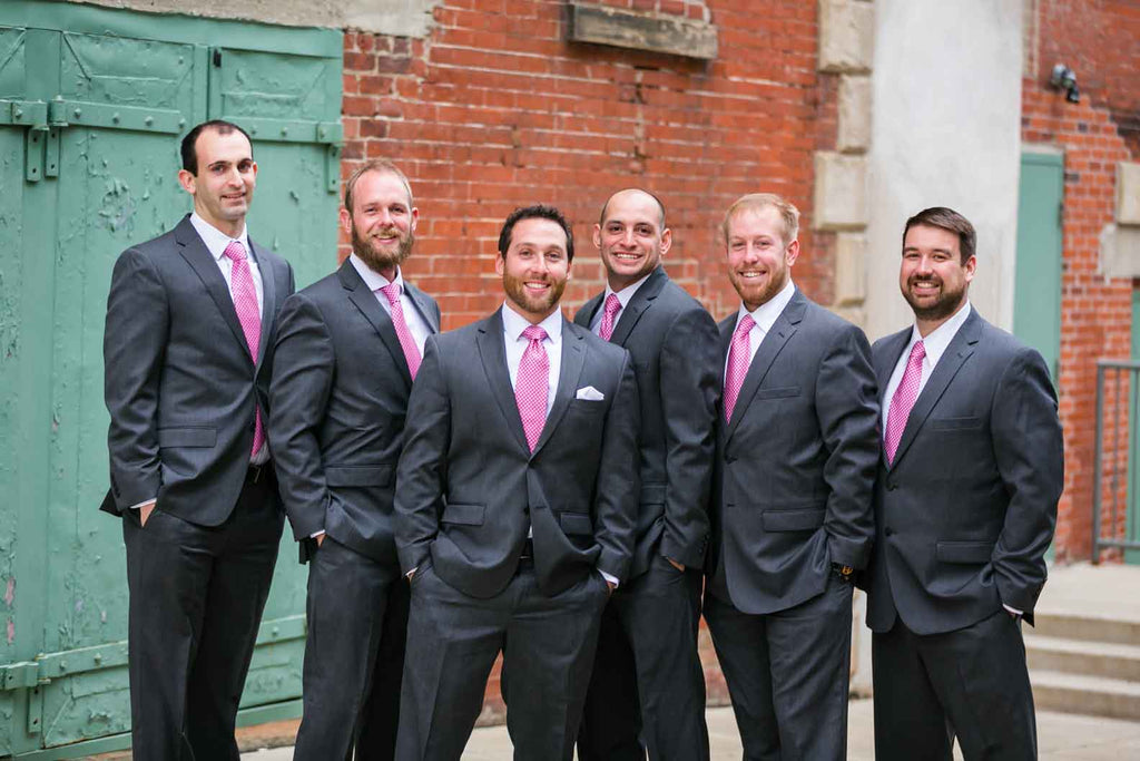 The groomsmen look handsome in pink! | A Blue and Pink Rock 'n Roll Wedding