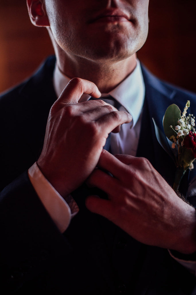 Groom-Getting-Ready-Emily-Caleb-Featured-BrideStory-Real-Wedding