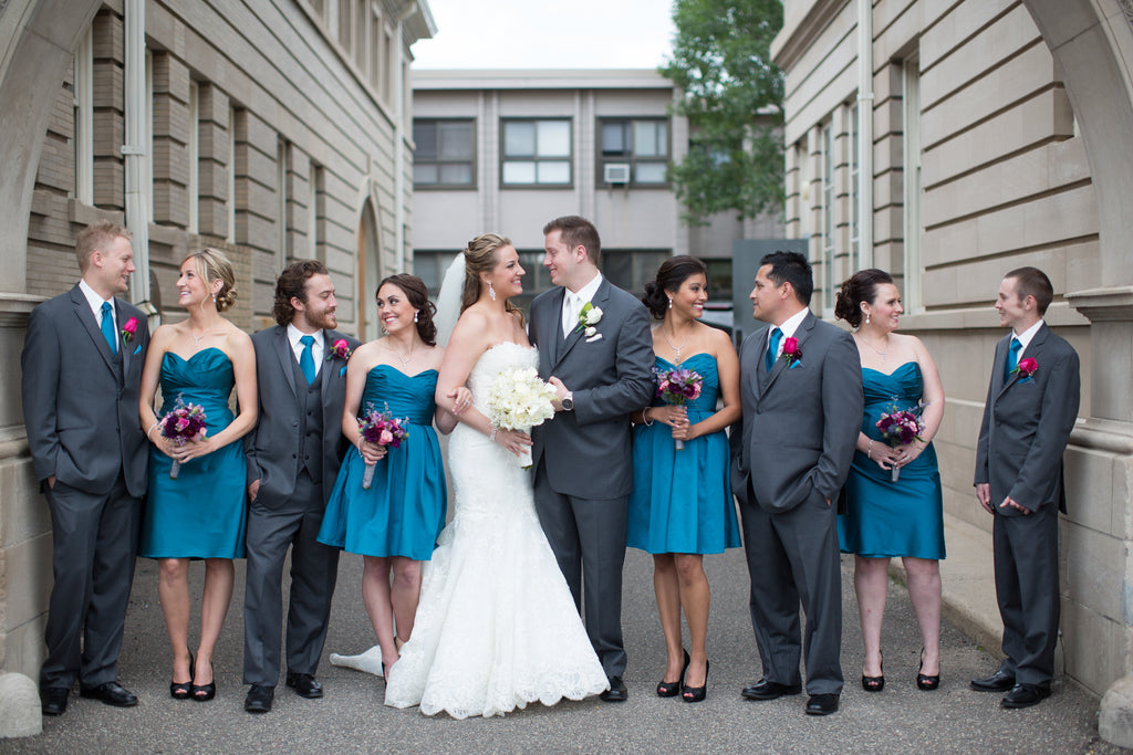 Taffeta bridesmaid dresses and gray men's suits. | A Romantic Jewel-Tone Wedding