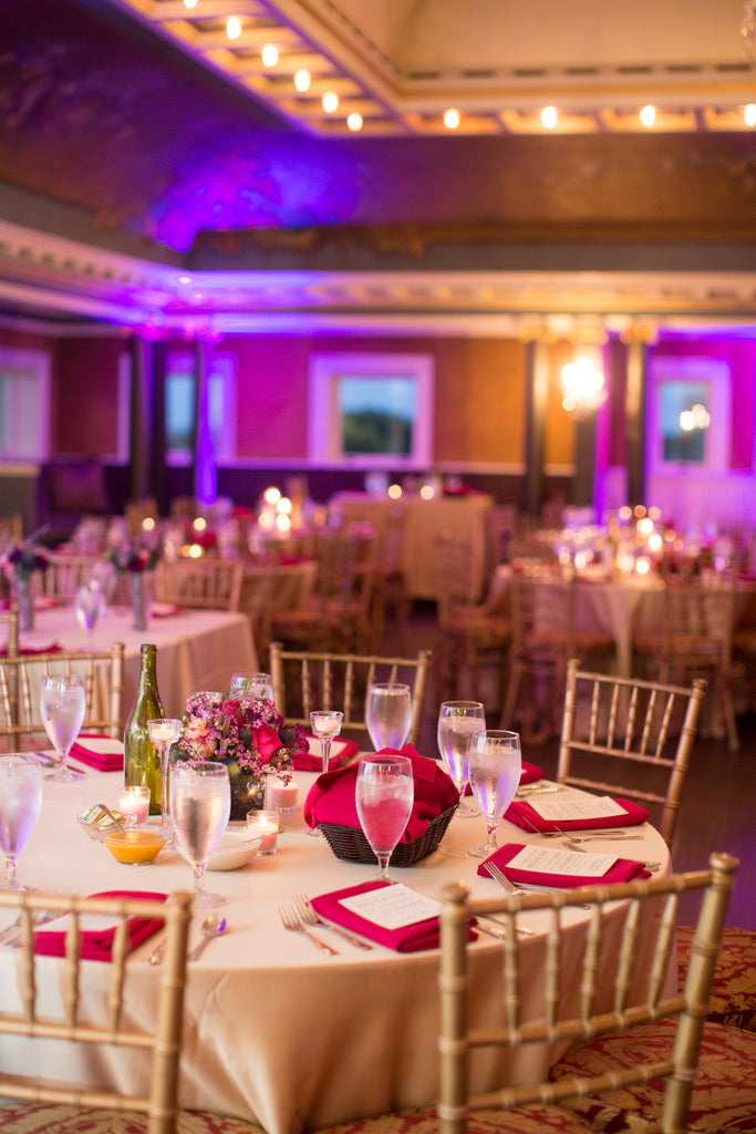 Elegant pink table settings in the Semple Mansion ballroom. | A Romantic Jewel-Tone Wedding