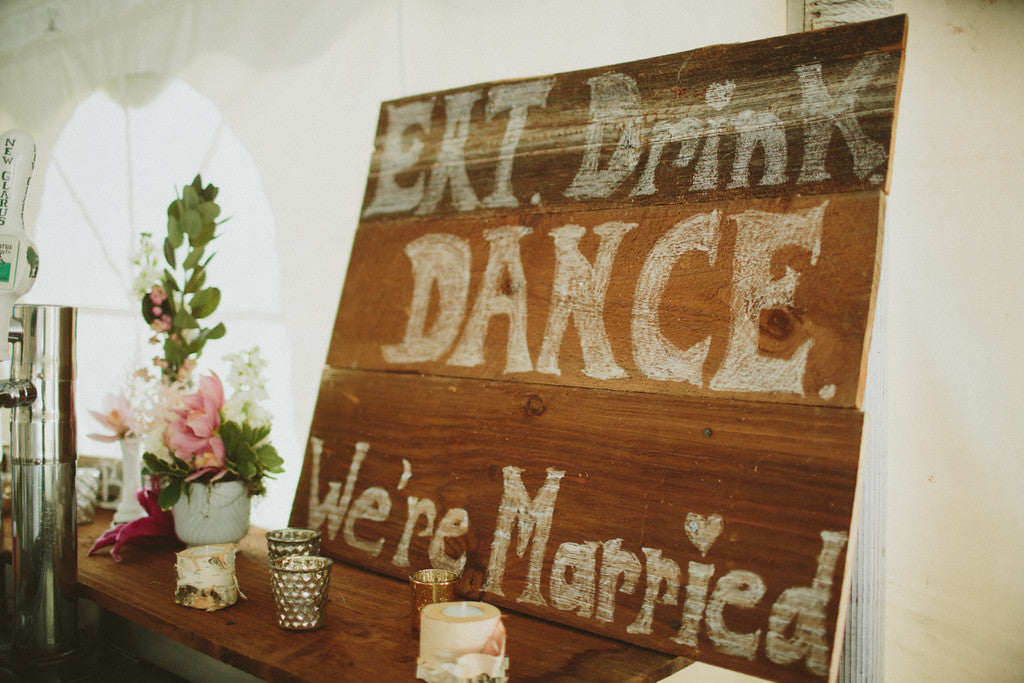 Painted text on wooden palette's will complement a rustic wedding theme! | Ways to Use Love Quotes For Weddings