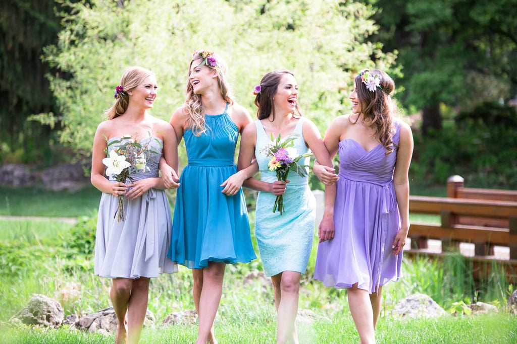 Style your bridesmaids in completely different dresses and colors for a fun mix and match look! | How to Nail the Mix and Match Trend