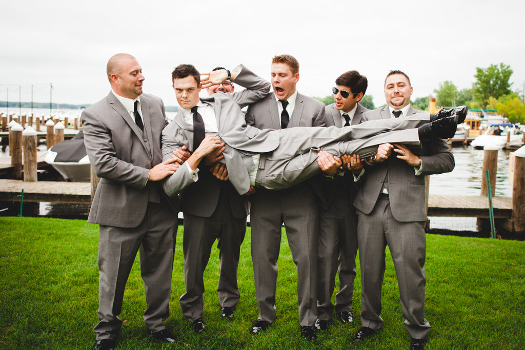 These groomsmen were handsome in their classic gray suits. | A Simple Wedding Dress for a Lakeside Ceremony