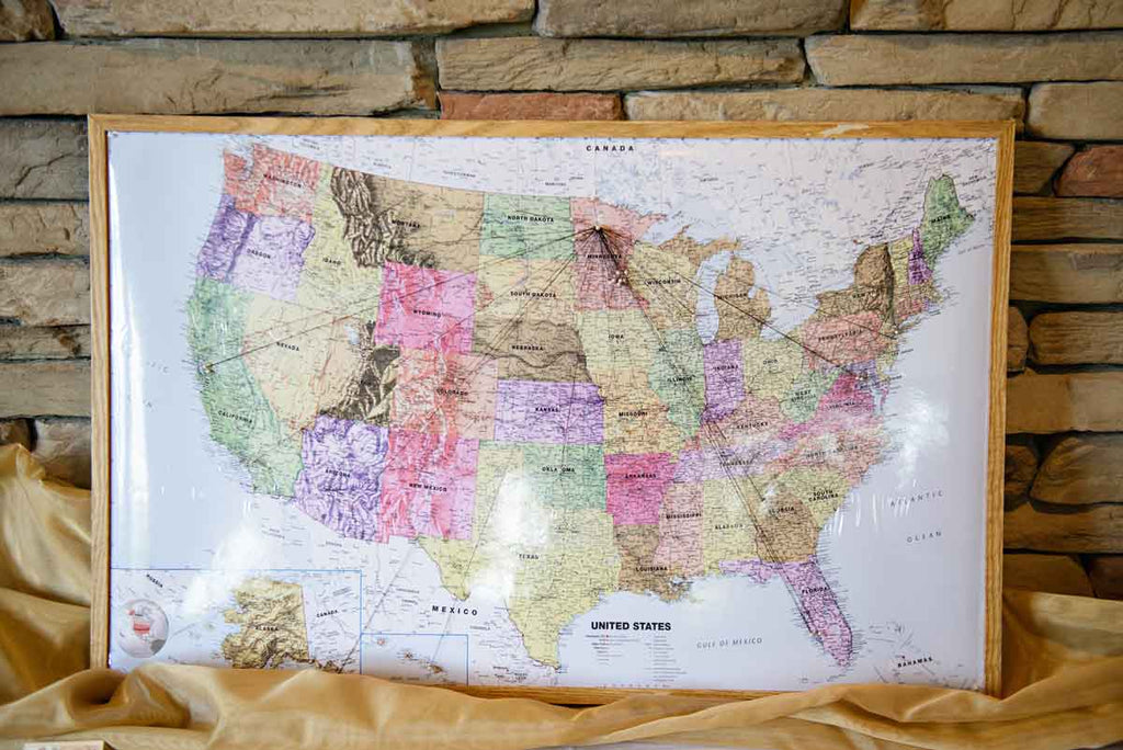 Show where all your guests have traveled from with this map display | Ways to Use Maps and Globes in Your Wedding Decor