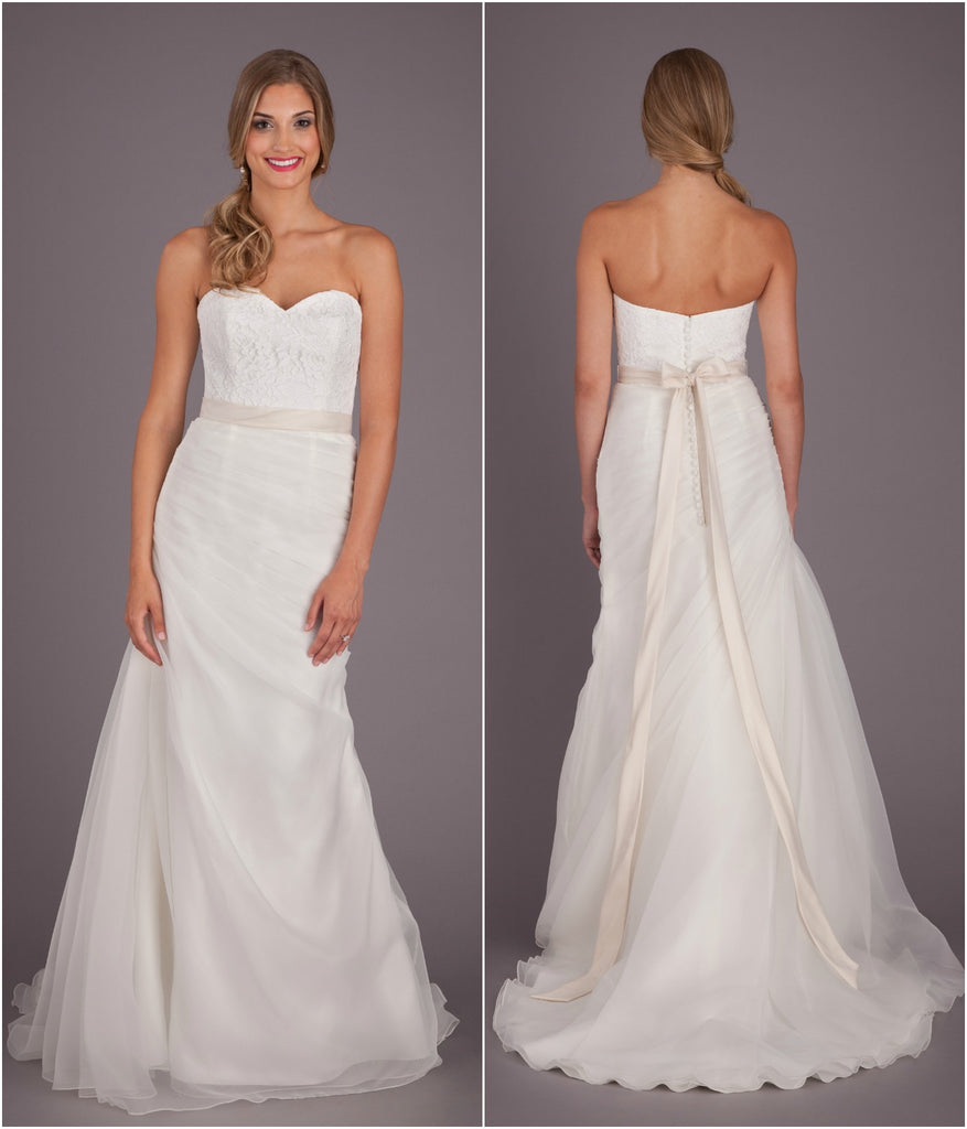 A unique bridal gown with a lace top and fitted, organza bottom. | Wedding Dresses Under $1000