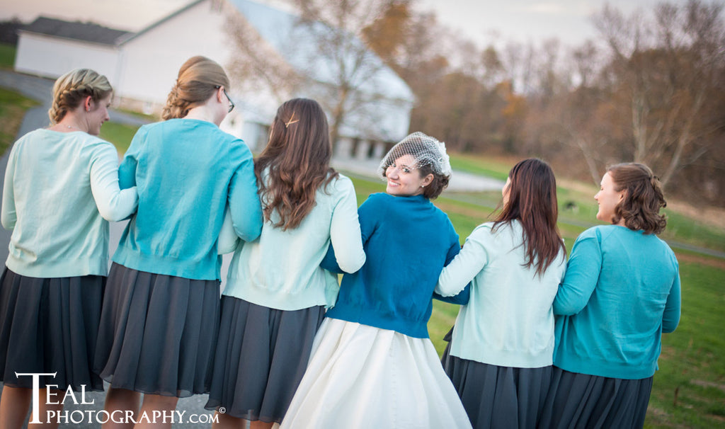 Cover up with a warm cardigan for your winter wedding! | Styling Winter Bridesmaid Dresses