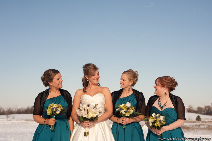 Shalls and cardigans are a cute and practical way to stay warm at a winter wedding. | Styling Winter Bridesmaid Dresses