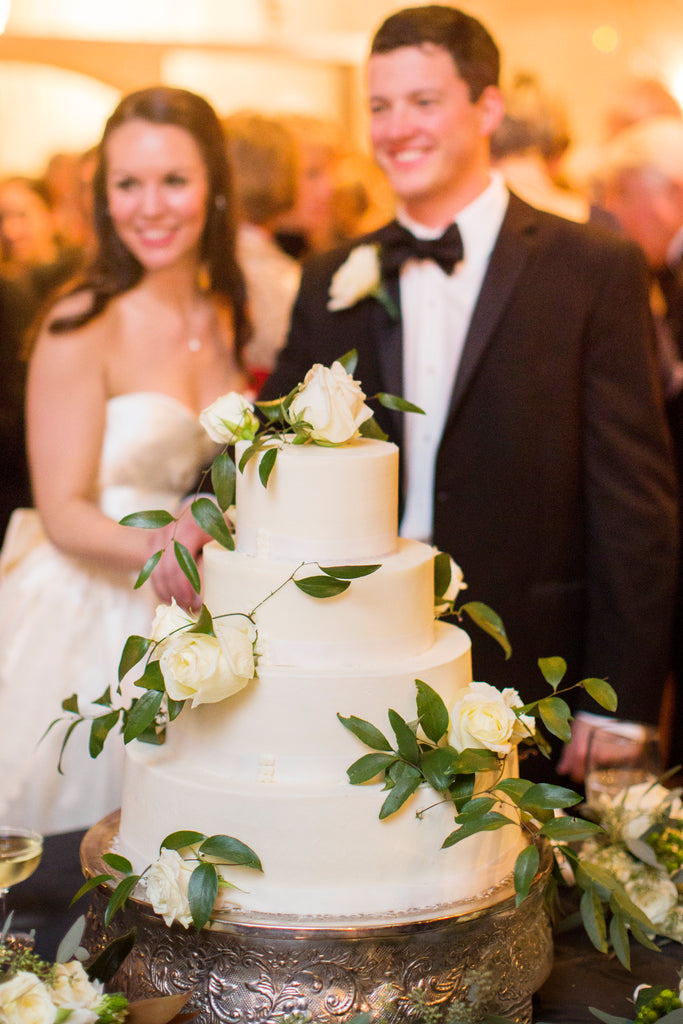 A white, winter wedding cake. | A Romantic Winter-Themed Wedding