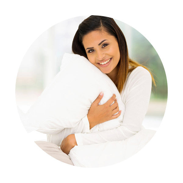 woman hugging pillow