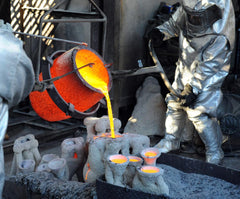 Molten steel poured into molds to create traditional Japanese cast iron teapots